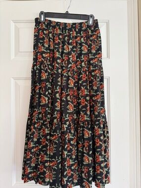 The White Lotus Black Maxi Skirt with Monkey Print